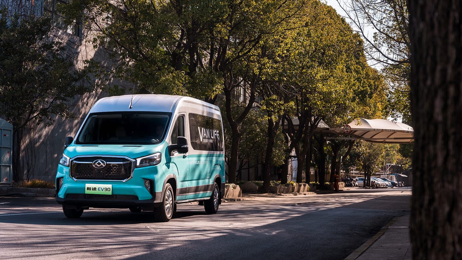 2026 MAXUS EV90 — Large Electric Van and 9–15 Seat Minibus for export, front three-quarter view of the passenger body
