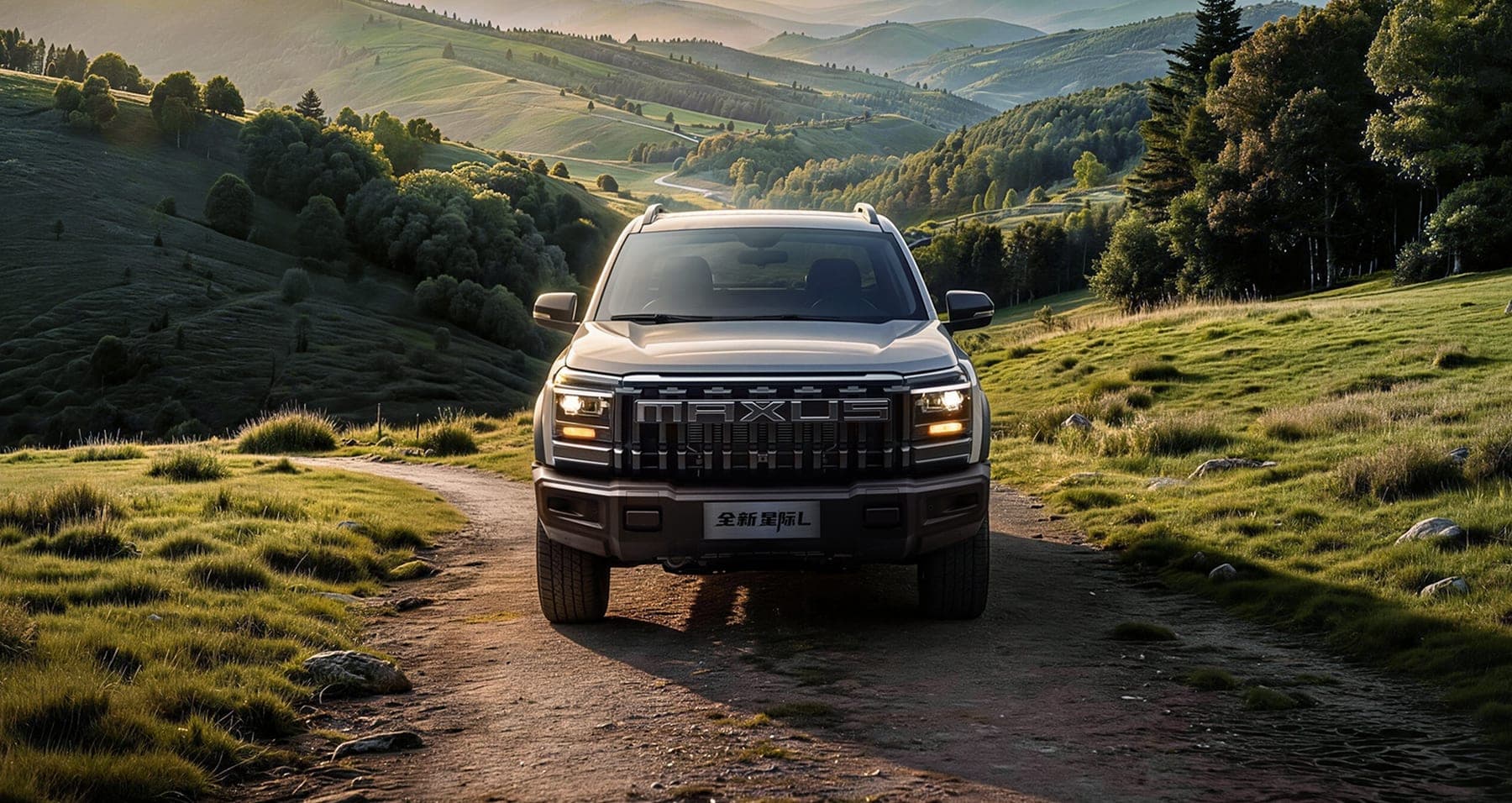 2026 MAXUS Interstellar L New Generation — Double Cab Diesel Pickup Truck for export, front view on a grass trail