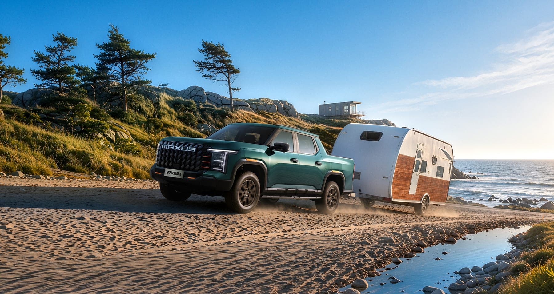 2027 MAXUS Interstellar X — Double Cab Diesel Pickup Truck for export, towing a caravan on a coastal track