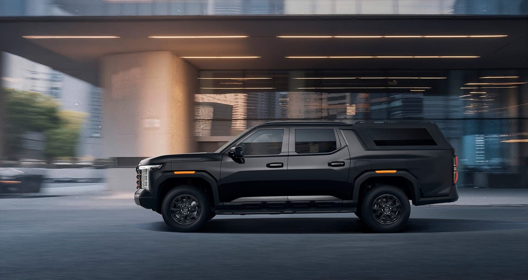 2027 MAXUS Interstellar X Passenger Edition — Double Cab Pickup Truck with Integrated Hardtop Canopy for export, side profile in an urban setting