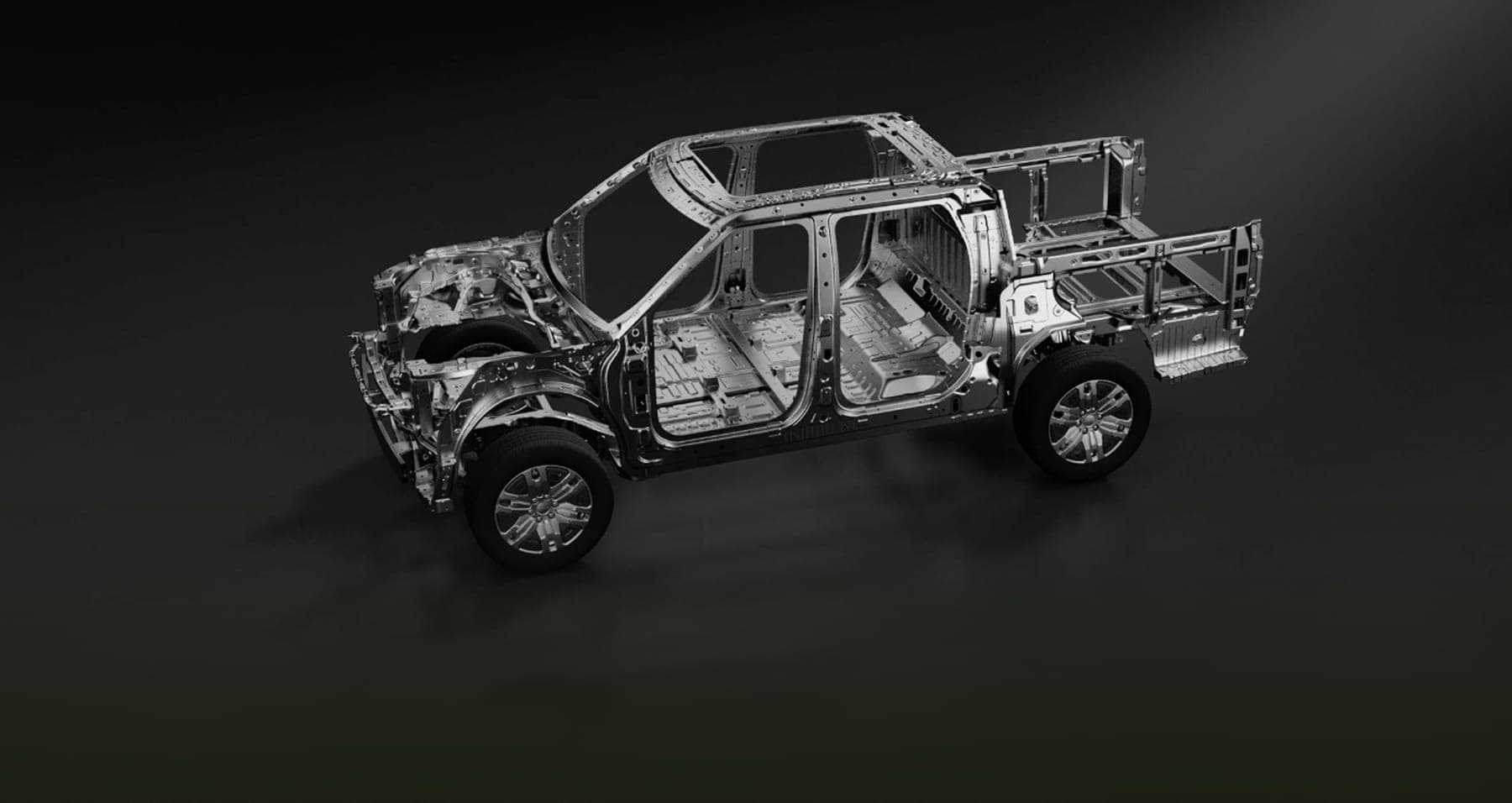 MAXUS Interstellar X Passenger Edition 2027 — بيك أب بكابينة مزدوجة مع غطاء صلب مدمج للتصدير, الهيكل الخام يُظهر الشاسيه السُّلّمي