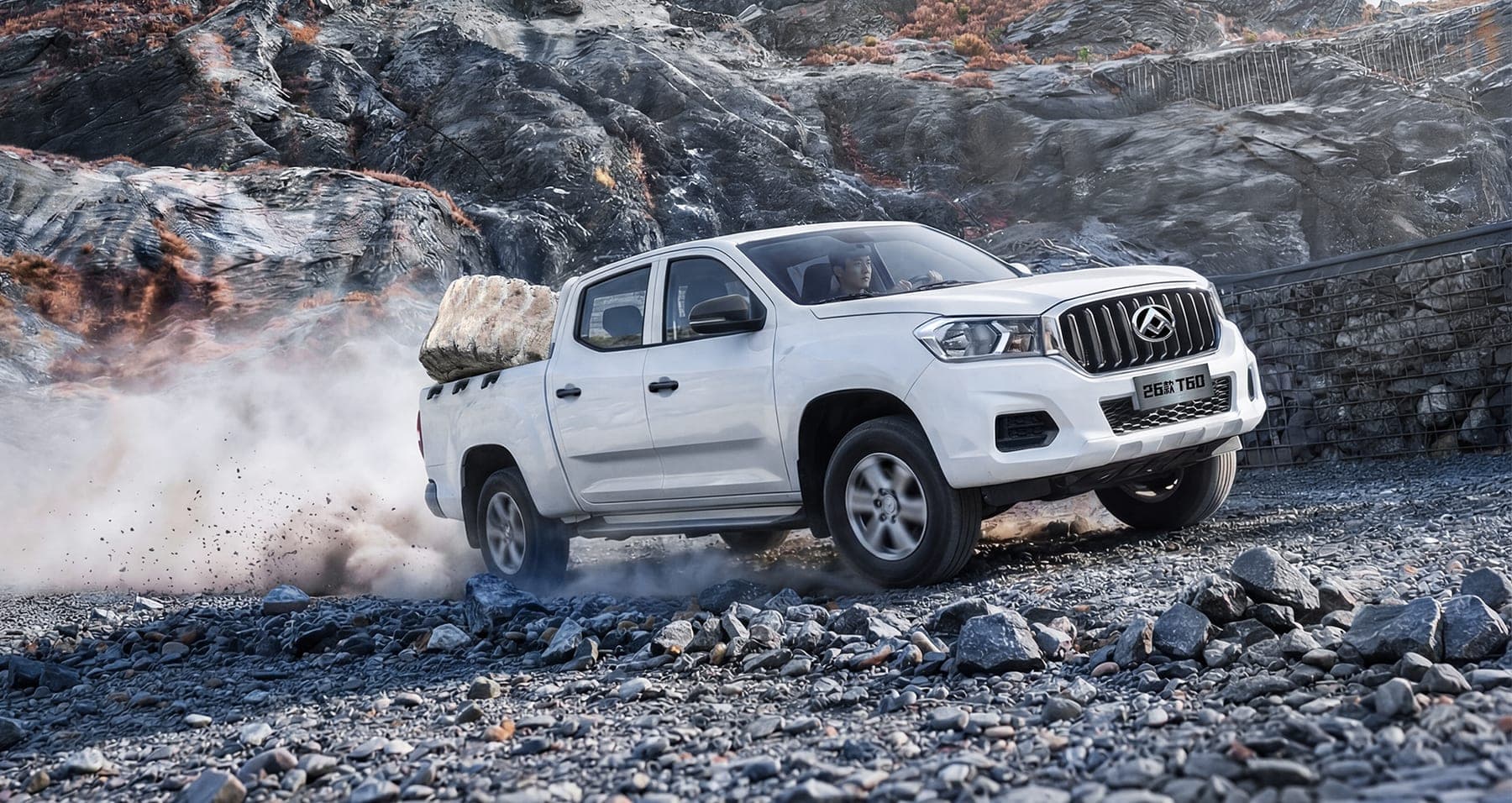 2026 MAXUS T60 — Double Cab Pickup Truck for export, front three-quarter view on a quarry road