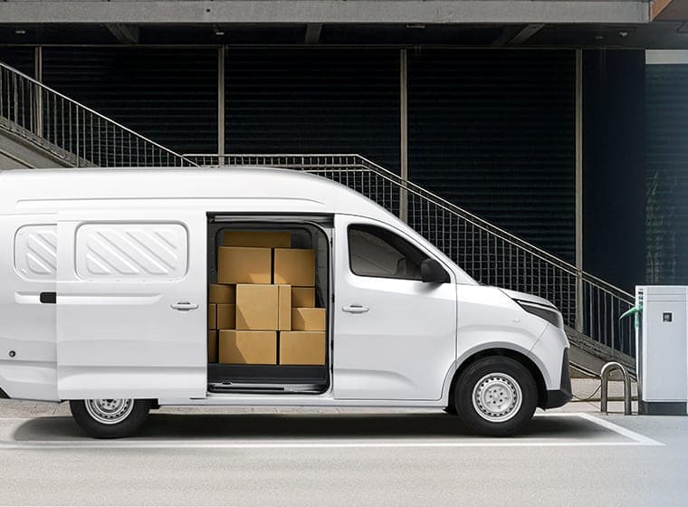 2026 MAXUS Lingsheng V100 Electric Van — Wide-Body Electric Cargo Van for export, side view with the sliding door open and loaded